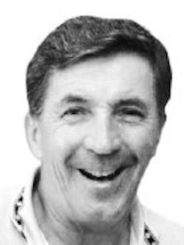Smiling man with short dark hair