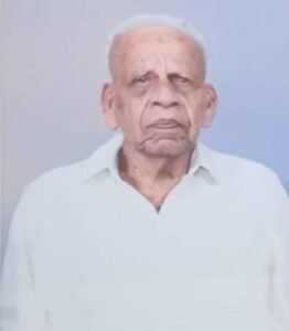 Elderly man with white hair and shirt, portrait
