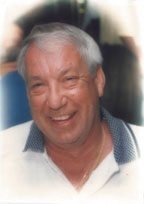 Smiling older man in casual shirt