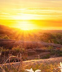 Bright sunrise over scenic natural landscape