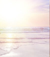 Serene sunrise over calm ocean waves