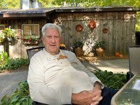 Man sitting outside in garden setting