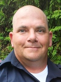 NICHOLLS , Christopher “Chris” Gary Nicholls