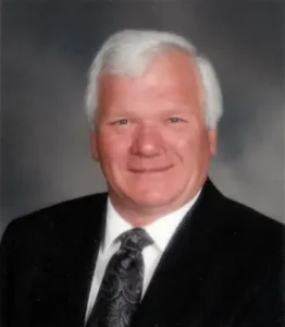 CHOLONIUK, Leo Choloniuk