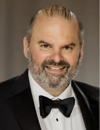 KAPRALOS, John Kapralos
