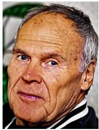 Portrait of an elderly man with gray hair.