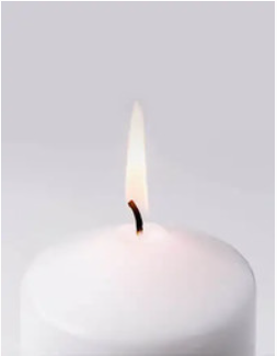 White candle burning with flame on top.