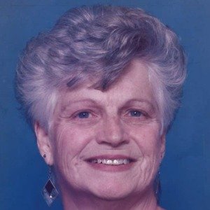 Smiling older woman with short gray hair