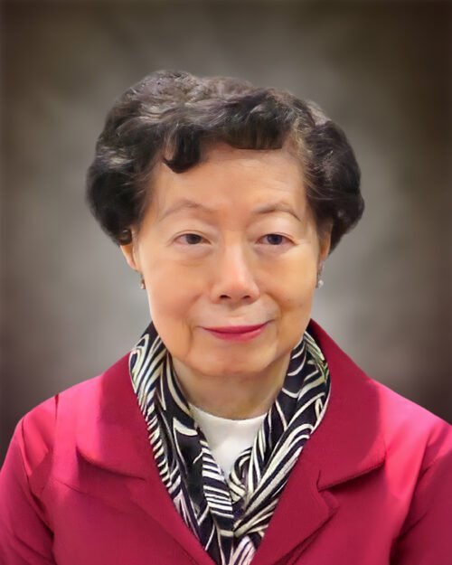 Smiling woman in red jacket