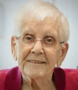 Elderly woman with glasses and short white hair
