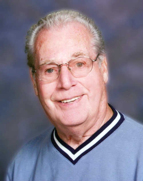 SONIER, Joseph Donald Sonier Smiling elderly man with glasses and sweater
