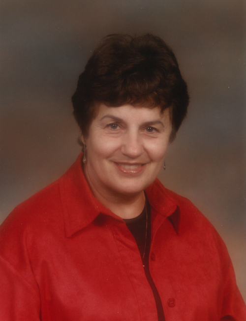 Smiling woman in red shirt portrait