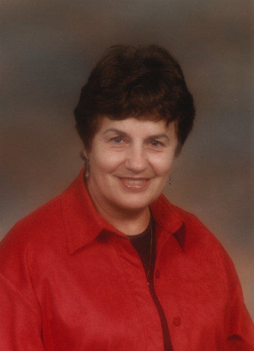 WAARD,Lieuwkje de Waard Smiling woman in red shirt portrait