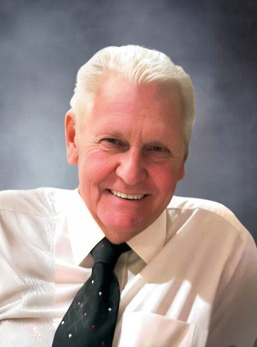 WHITE, Kenneth James White Smiling man in white shirt with black tie.