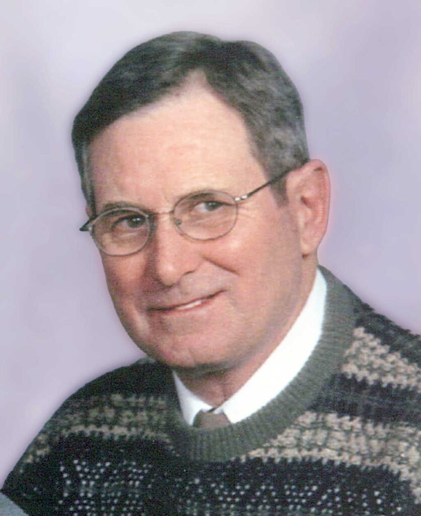 RICHARDSON, Douglas John Richardson Man in glasses wearing a patterned sweater