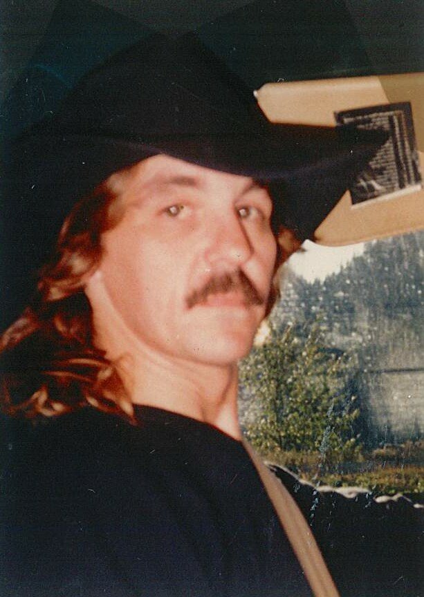 MACAINSH, Alan William MacAinsh Man in cowboy hat driving car