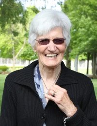 Smiling elderly person in outdoor setting
