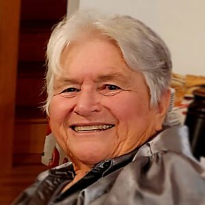 Smiling senior woman with gray hair indoors