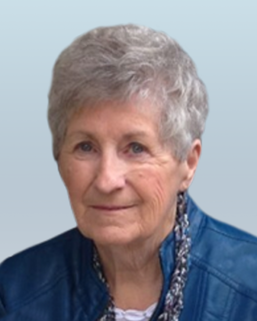Elderly woman smiling blue jacket portrait