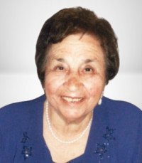 PROTOMANNI, Armena Protomanni Smiling elderly woman in blue outfit