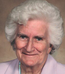 REMPEL, Helen Rose Rempel Smiling elderly woman with white hair and light top.