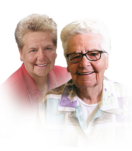 Two senior women smiling together.