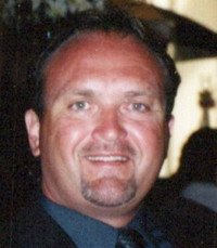 Smiling man in a suit and tie