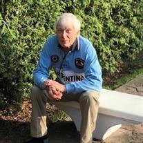 Elderly man sitting on a garden bench