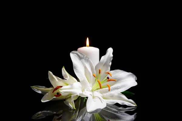 depositphotos 254549016 stock photo funeral lily flowers and burning (1)