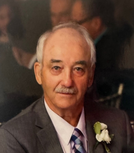 SIPPEL, Robert Kenneth Sippel Elderly man in suit with white boutonniere.