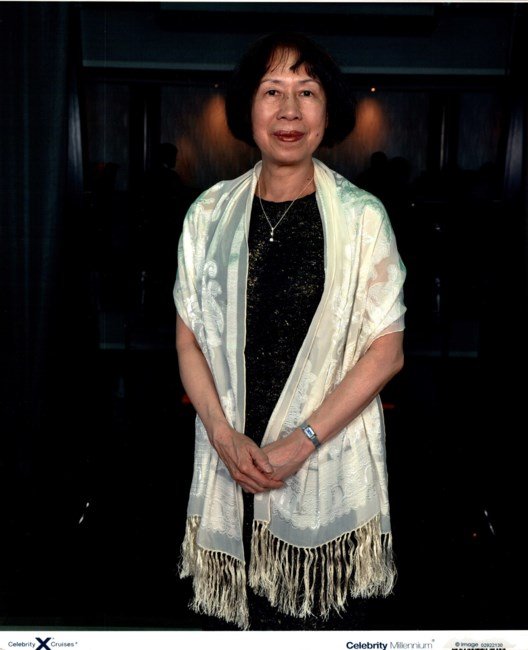 Woman wearing elegant shawl at formal event.