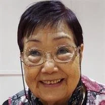Smiling elderly woman with glasses