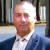 Man in suit standing outdoors