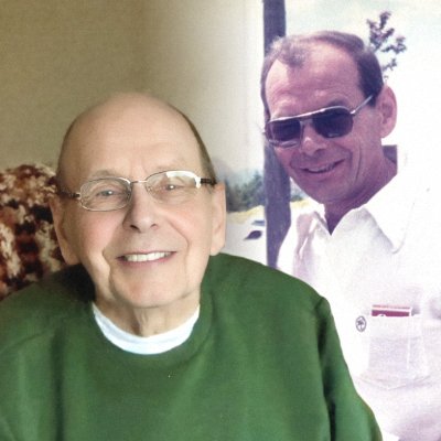 Older man smiling with past photo overlay