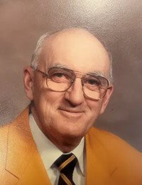Elderly man in glasses, yellow suit jacket