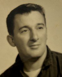 Vintage portrait of a man with short hair.