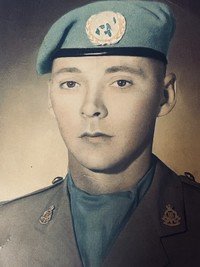 Soldier in uniform with blue beret portrait