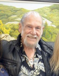 Smiling man in tropical shirt and jacket