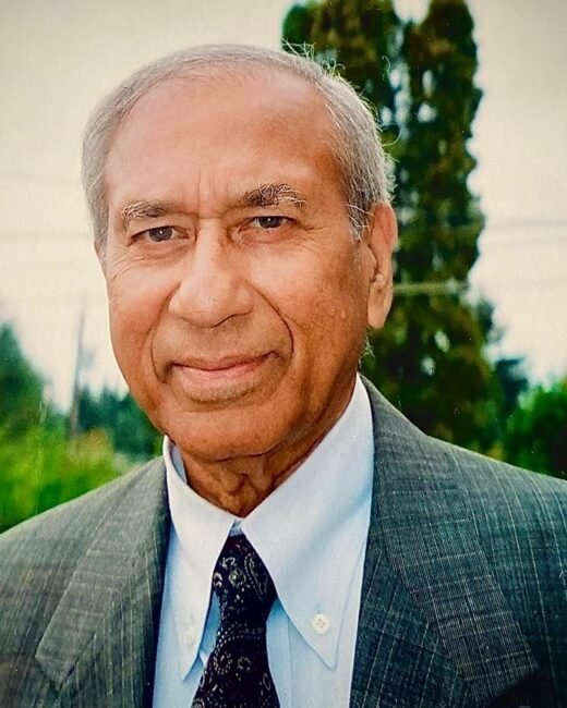 Senior man in a suit outdoors