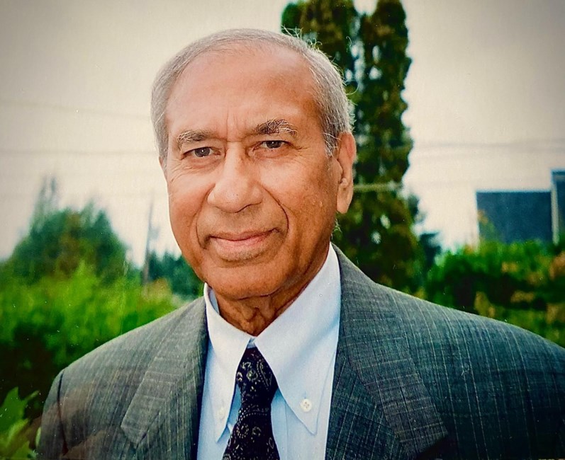 Senior man in a suit outdoors