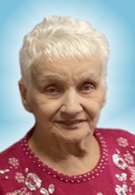 Portrait of elderly woman with white hair in pink.