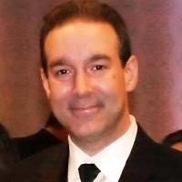 Smiling man in formal attire