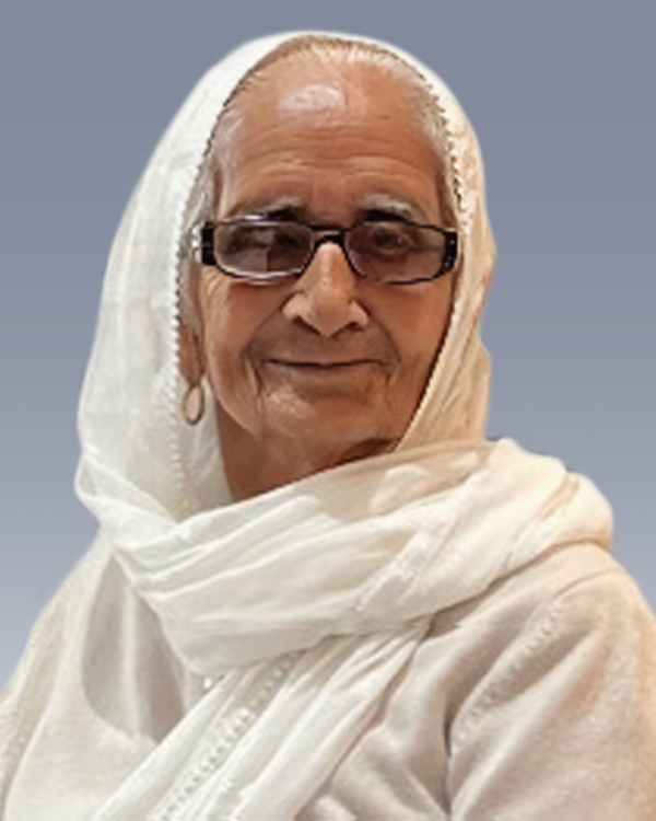 KAUR, Jaswinder Kaur Elderly woman in white headscarf and glasses smiling.