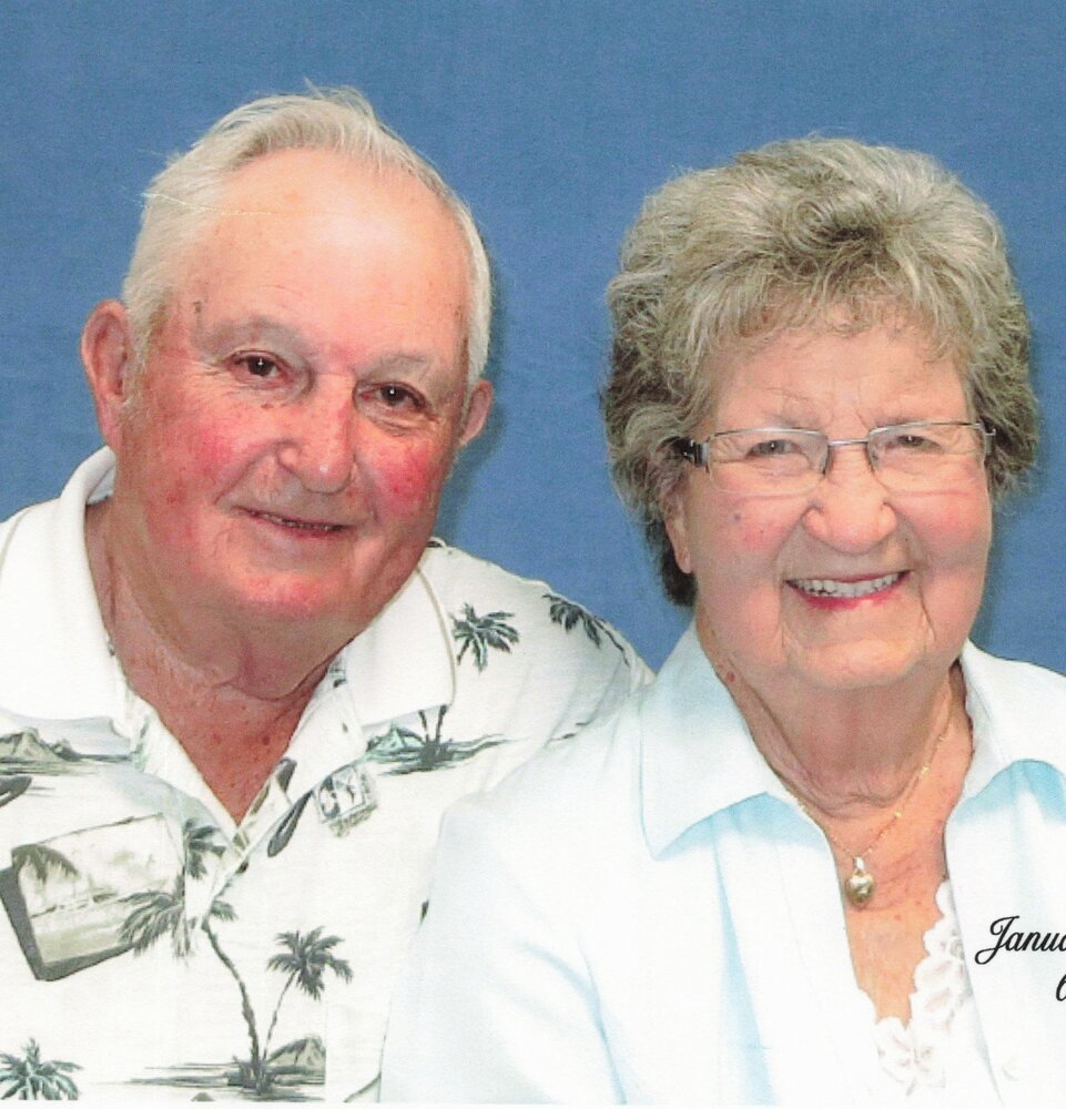 JENNER, John Jenner Elderly couple smiling in a portrait.
