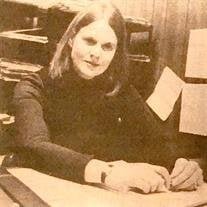 Woman working at office desk, vintage photograph.