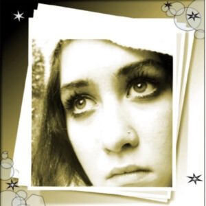Sepia photo of a woman looking upward thoughtfully.