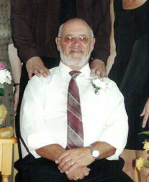 Elderly gentleman in formal attire at gathering