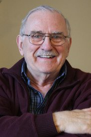 HOFFMAN, Keith Hoffman Smiling elderly man with glasses and mustache.