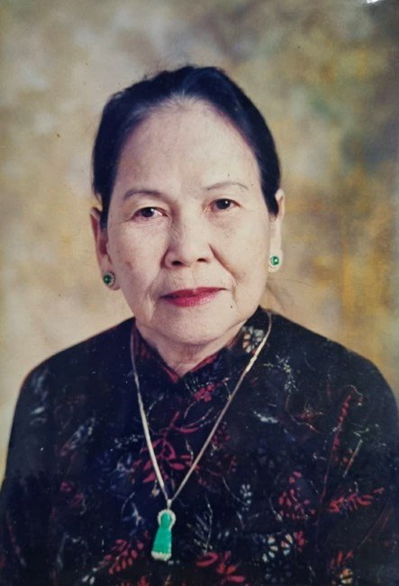 Elderly woman in traditional attire portrait