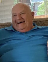 Smiling man sitting on the couch